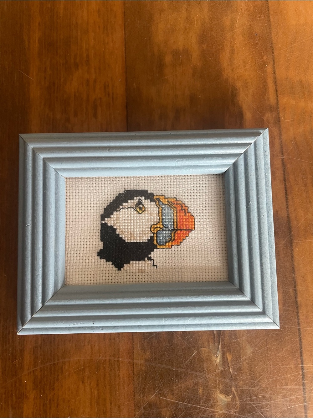 Small Framed handmade Puffin Cross-Stitch Wall Art in Light Blue Frame home deco